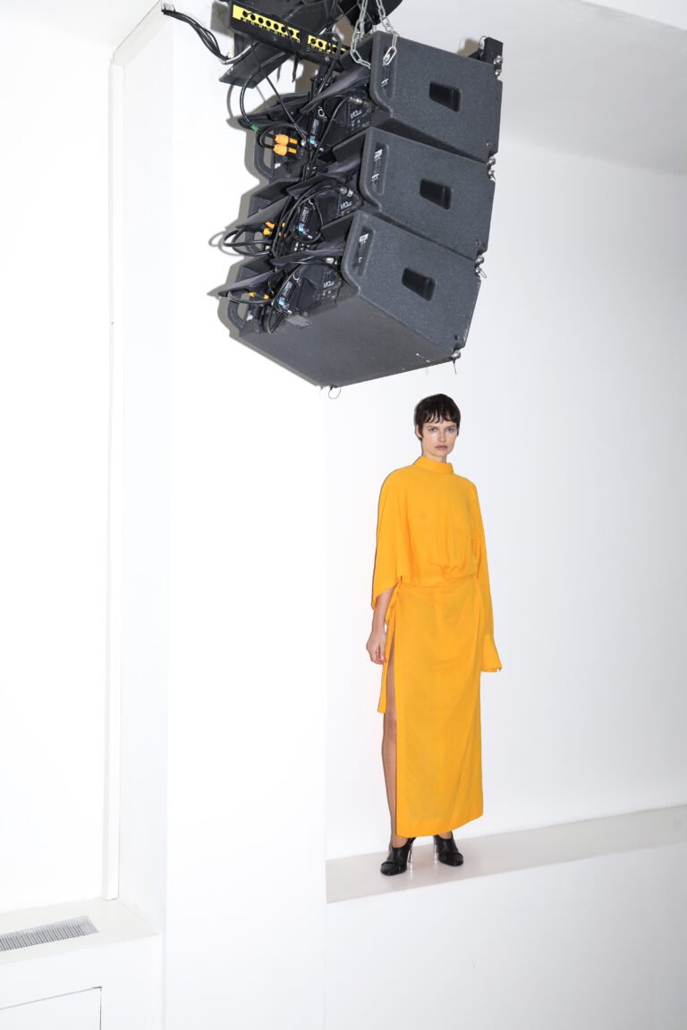 dress ISSEY MIYAKE, shoes ACNE STUDIOS