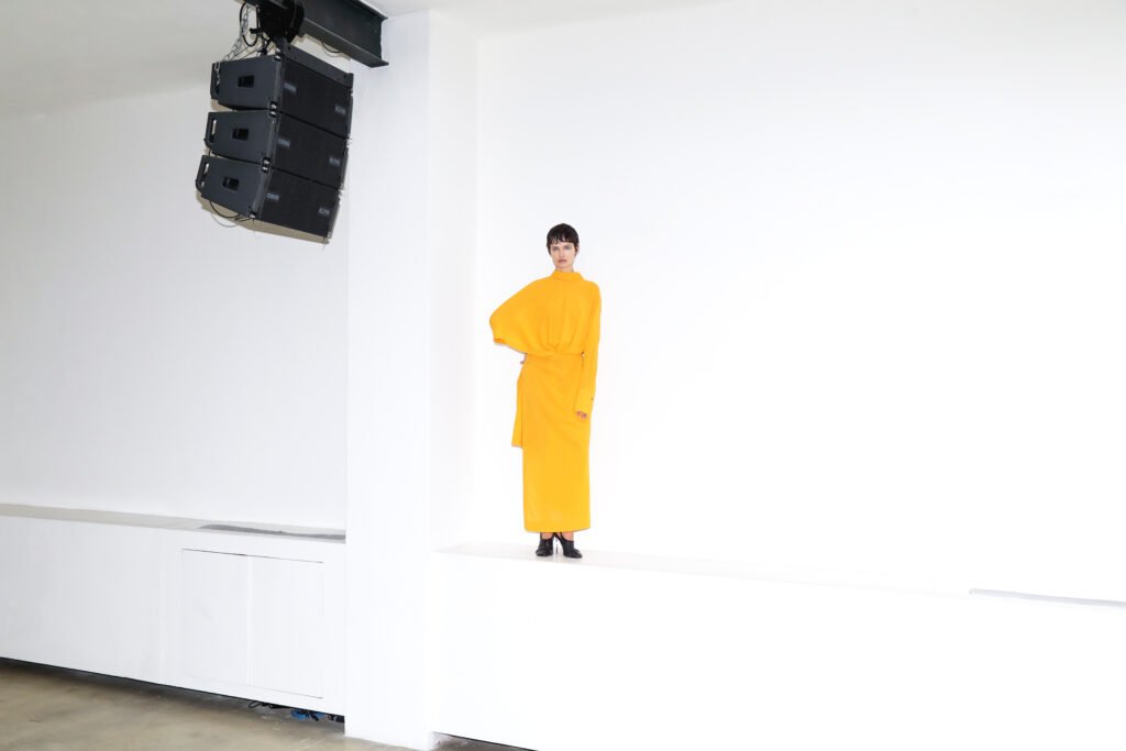 dress ISSEY MIYAKE, shoes ACNE STUDIOS
